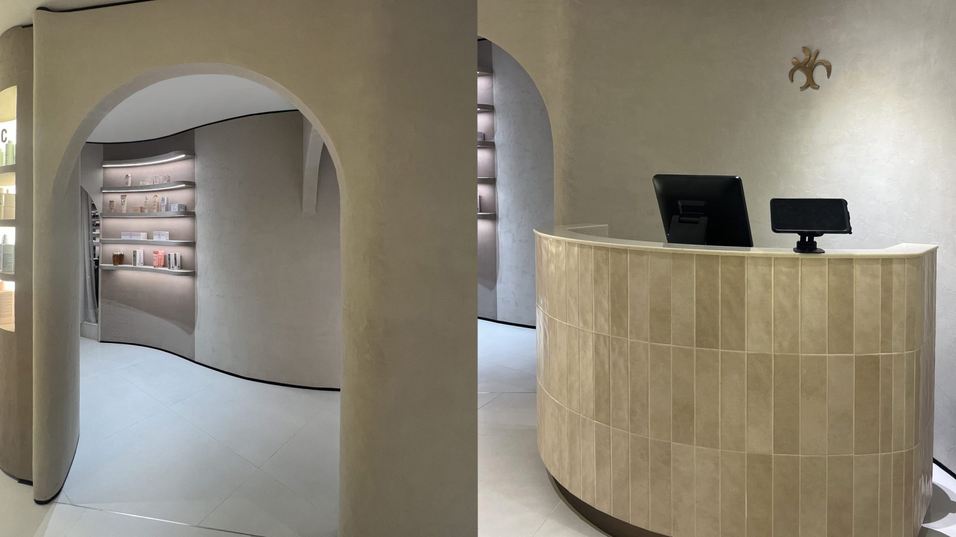 This stylish and chic beauty salon has just recently opened its doors inside Souk Al Bahar. Our team created some beautiful curved walls and custom display shelving throughout. Lighting is soft and complementary to the neutral tones of the walls and floors. Take your time going through these photos.