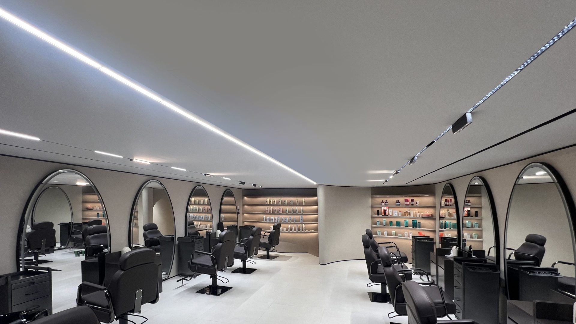 This stylish and chic beauty salon has just recently opened its doors inside Souk Al Bahar. Our team created some beautiful curved walls and custom display shelving throughout. Lighting is soft and complementary to the neutral tones of the walls and floors. Take your time going through these photos.